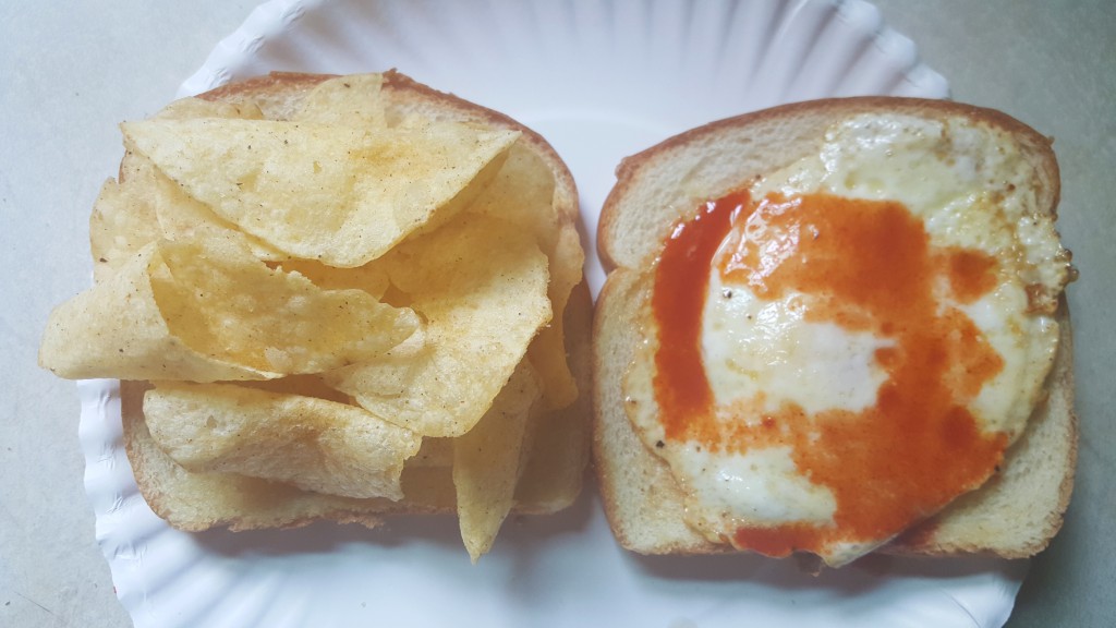 Lay's Southern Biscuits and Gravy chips with fried egg and hot sauce