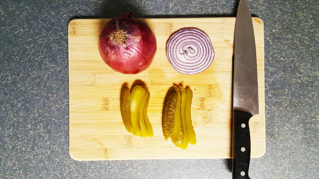 Sliced onion and gherkin