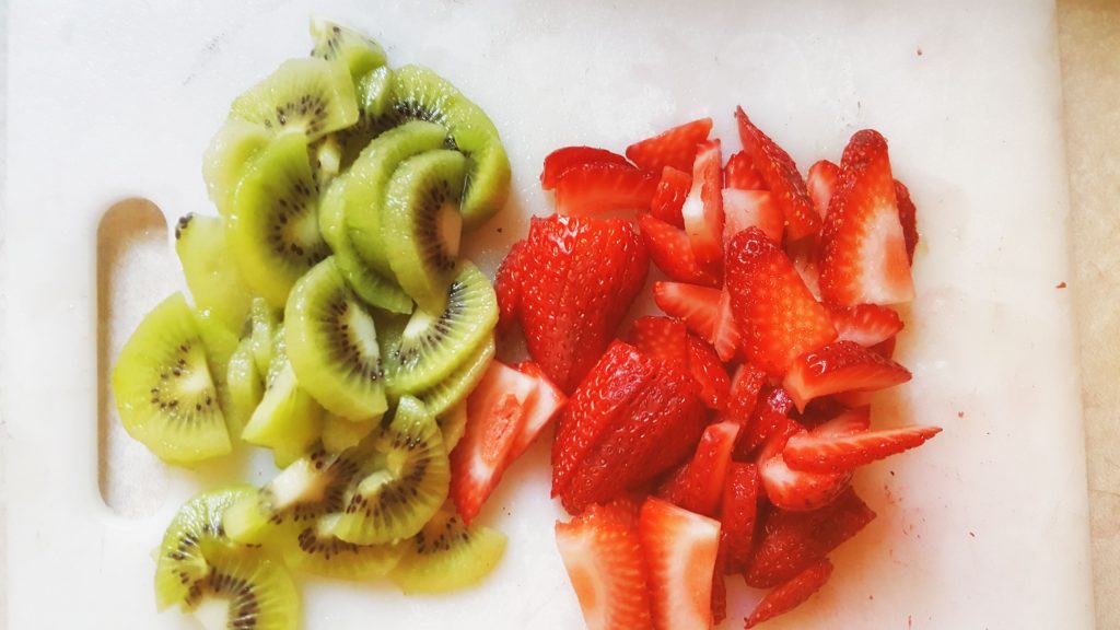 Sliced strawberry and kiwi
