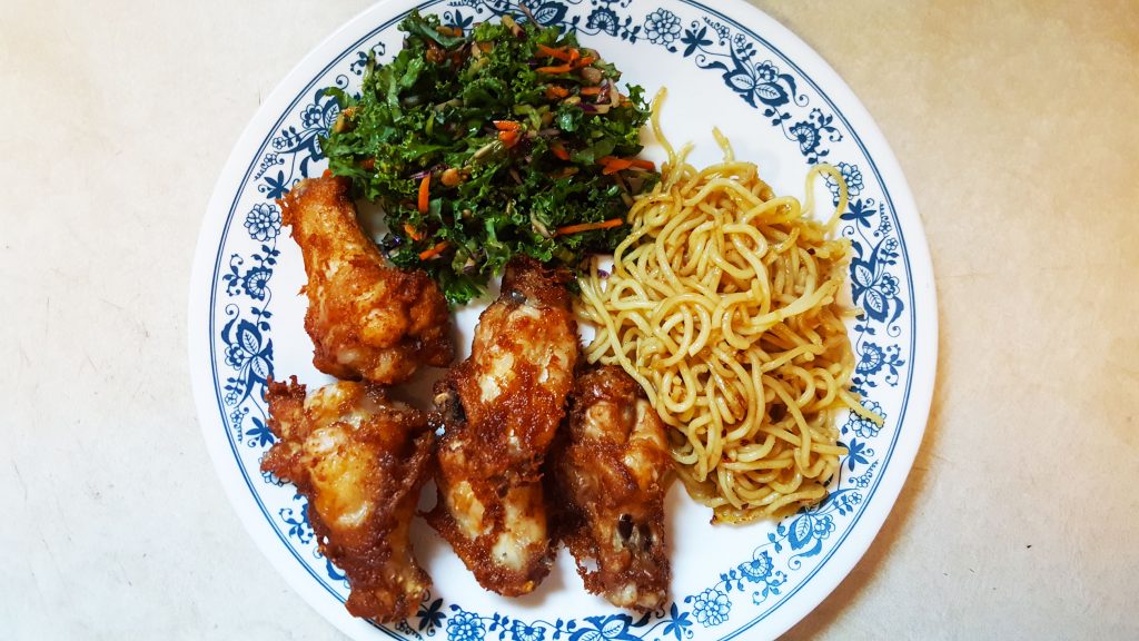 Har Cheong Gai wings with stir-fried noodles and kale salad