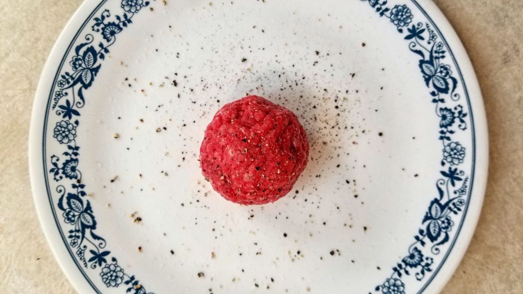 A seasoned ball of ground beef