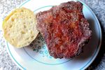 Thick-cut pork chop, marinated, dredged, and fried