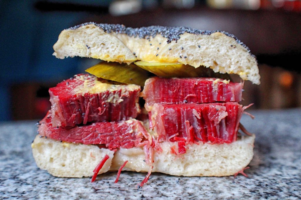 Salt beef bagel with mustard and pickles