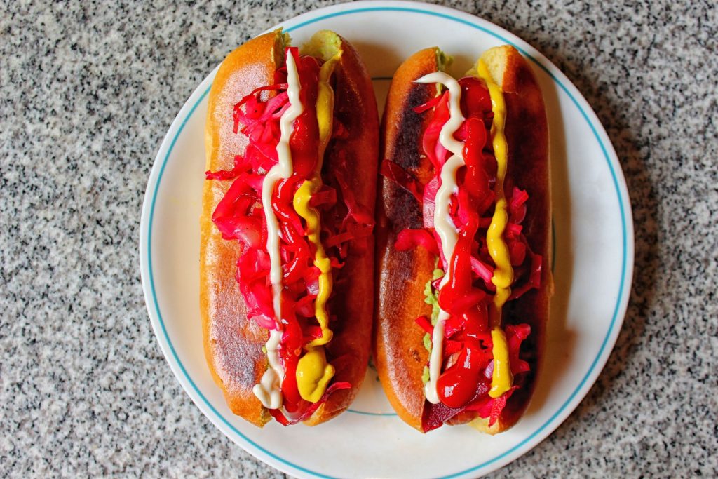 Hot dog shucos on top-split buns