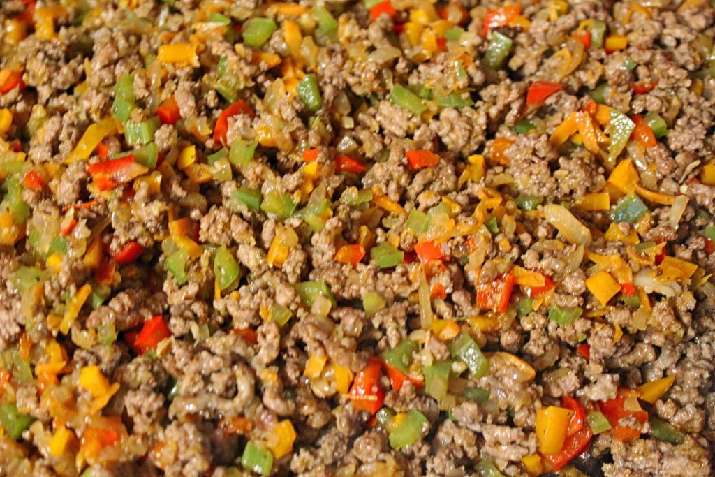 sauteed aromatics with cooked ground beef